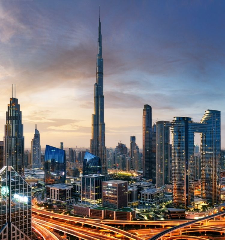 Dubai,Skyline,At,Sunset,With,Burj,Khalifa,-,Aerial,View,